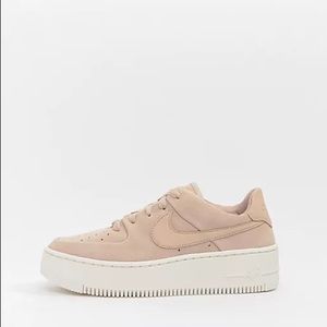 Light pink suede Nike Air Force ones